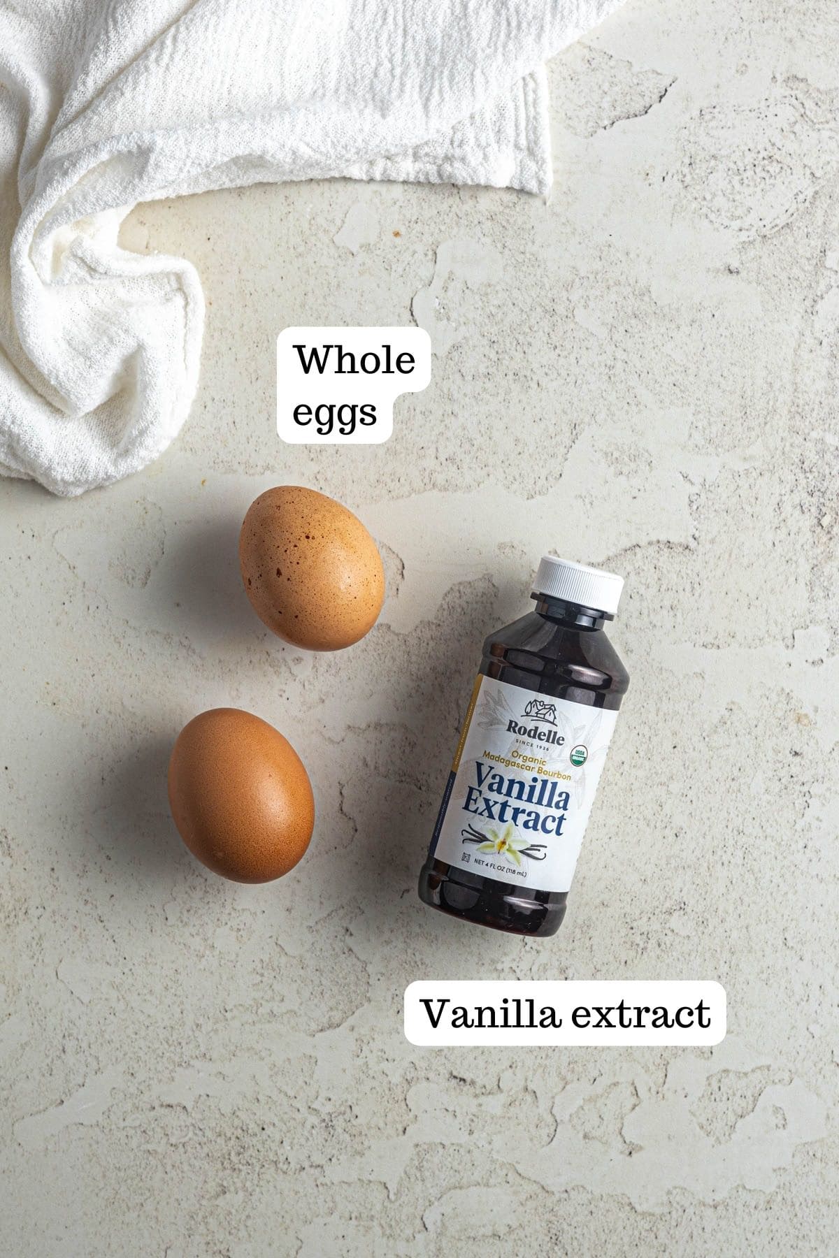 Image showing whole eggs and vanilla extract for White Chocolate Raspberry Blondies.