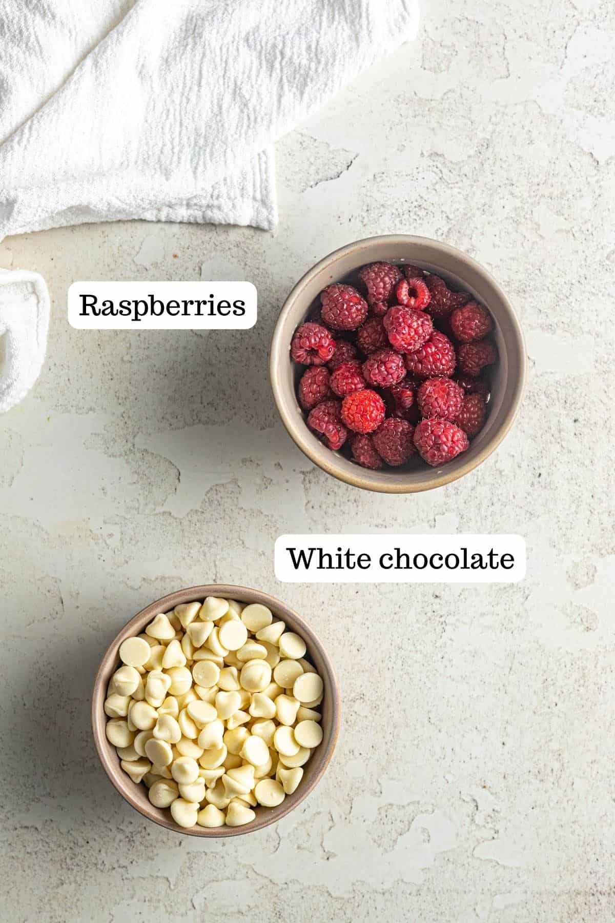Image showing bowls with raspberries and white chocolate chips for White Chocolate Raspberry Blondies.