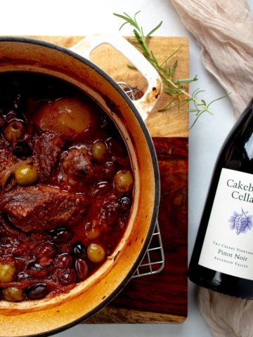 Finished Italian Braised Beef and Olives in the pot served with Cakebread Cellars Pinot Noir