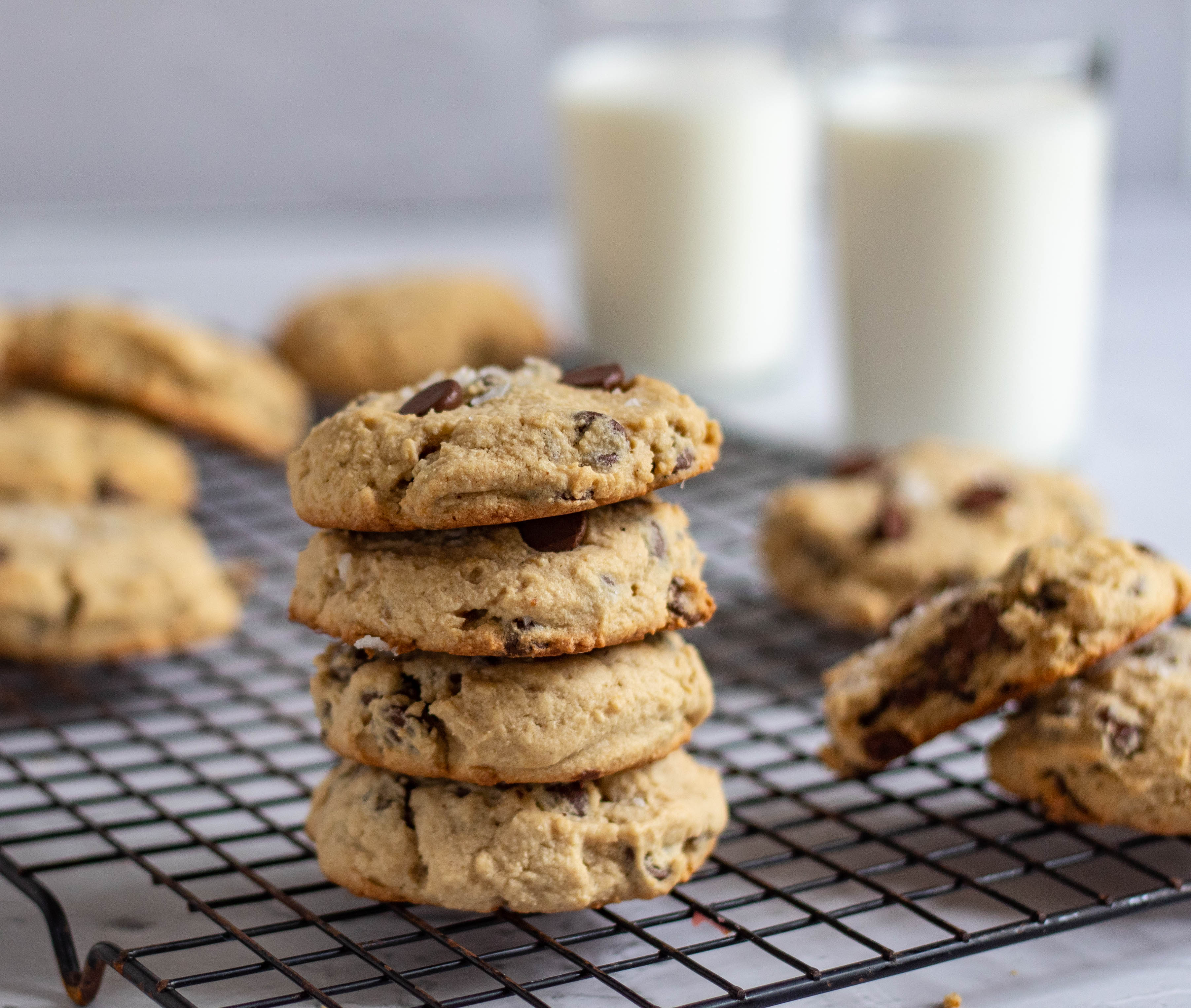 Stack of chewy peanut butter banana chocolate chip cookies