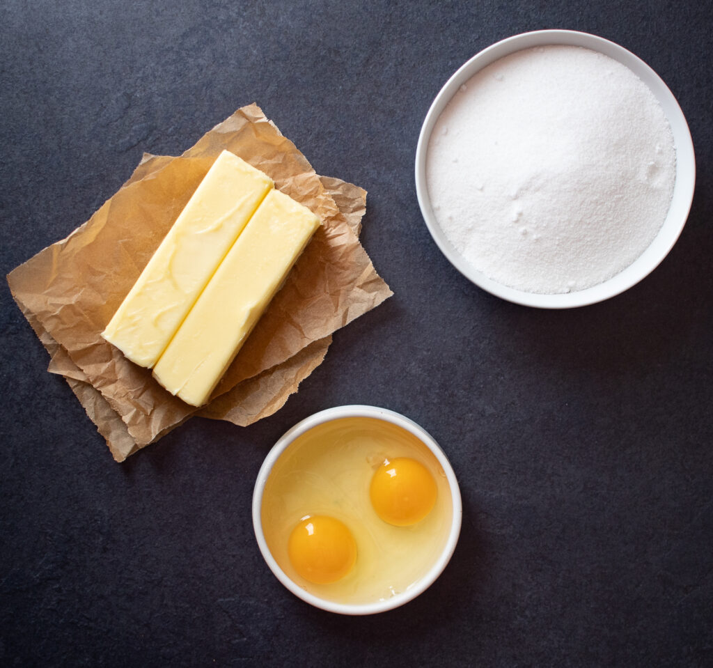 butter, sugar, and eggs for the cake