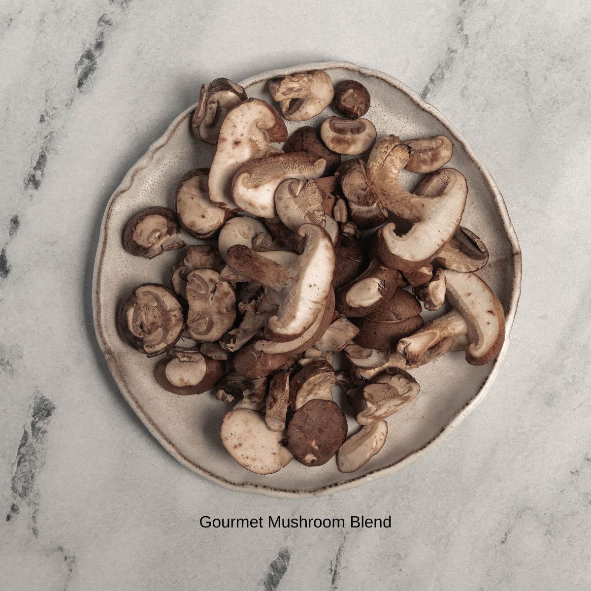 Ingredient image for Pumpkin and Mushroom Risotto. Shows sliced gourmet blend mushrooms.